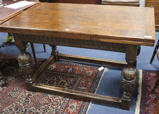 An oak draw leaf table, W.130cm